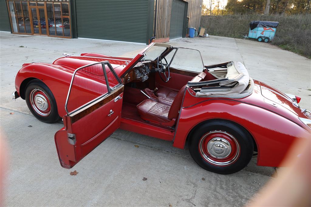 A 1955 Jaguar XK140 DHC